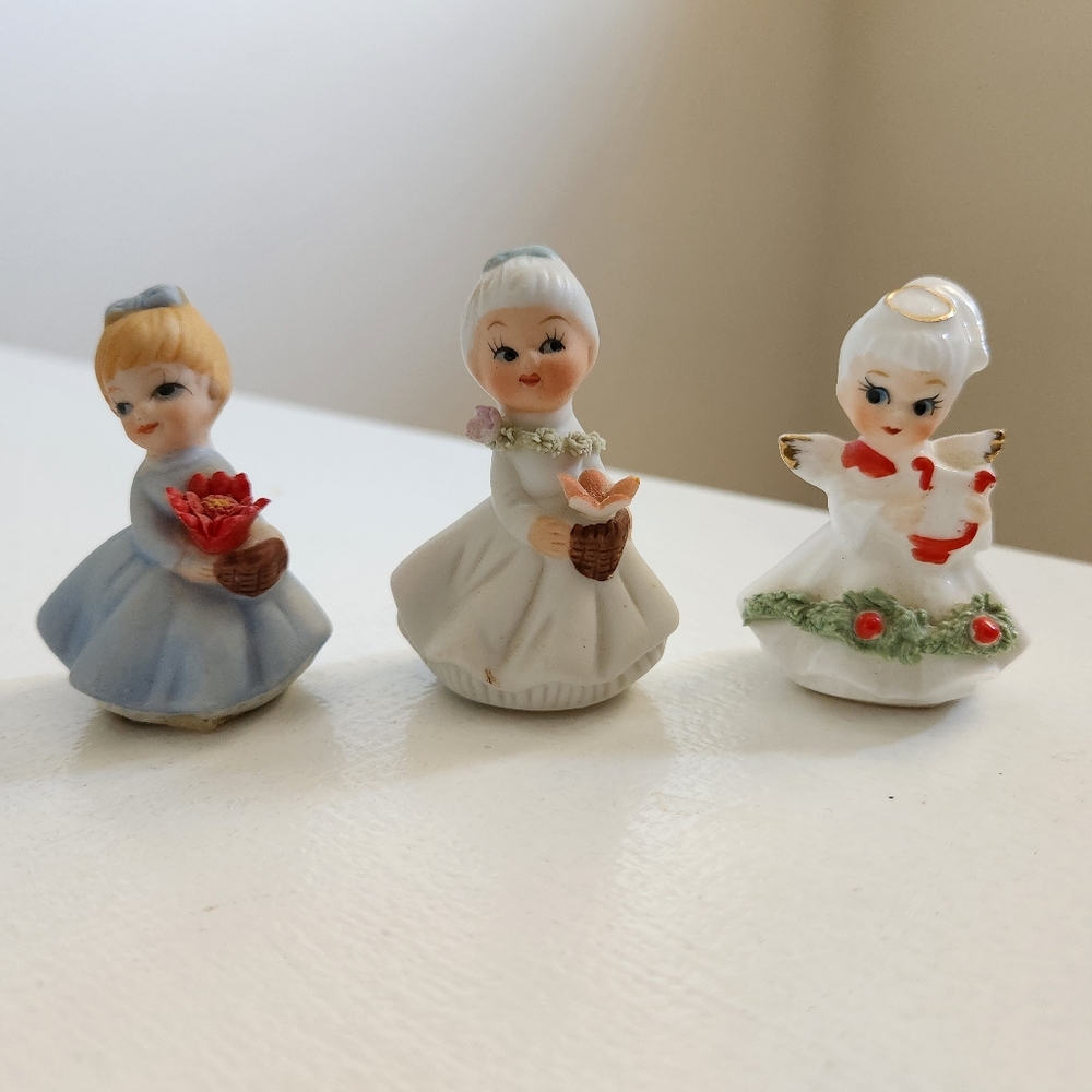 Three ceramic little lady miniature figurines